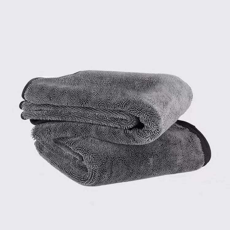 Double-sided braided absorbent towel